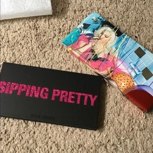 Kylie sipping pretty eyeshadow palettes